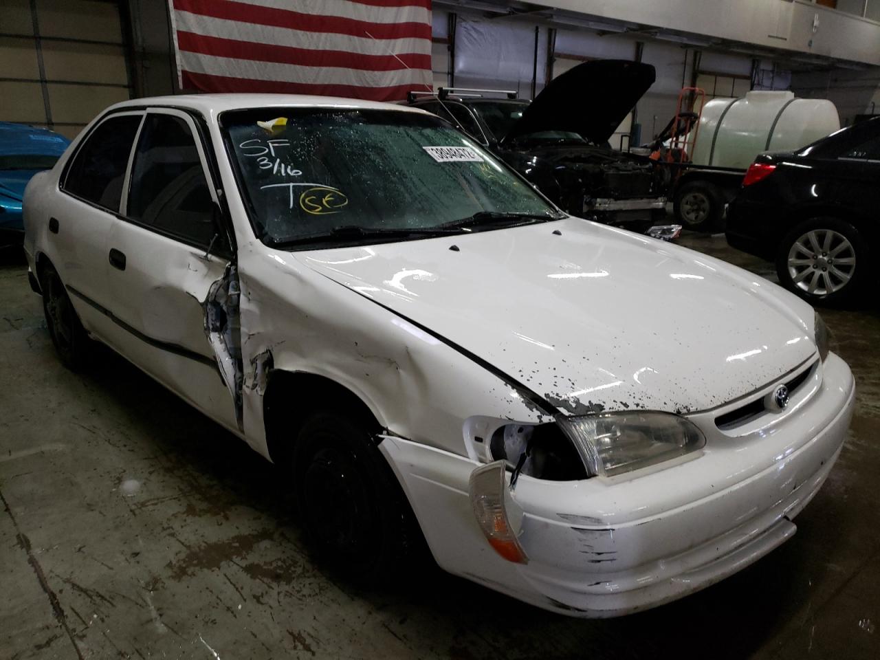 TOYOTA COROLLA VE 2000 with VIN 1NXBR12E7YZ339626 - Photo from auction