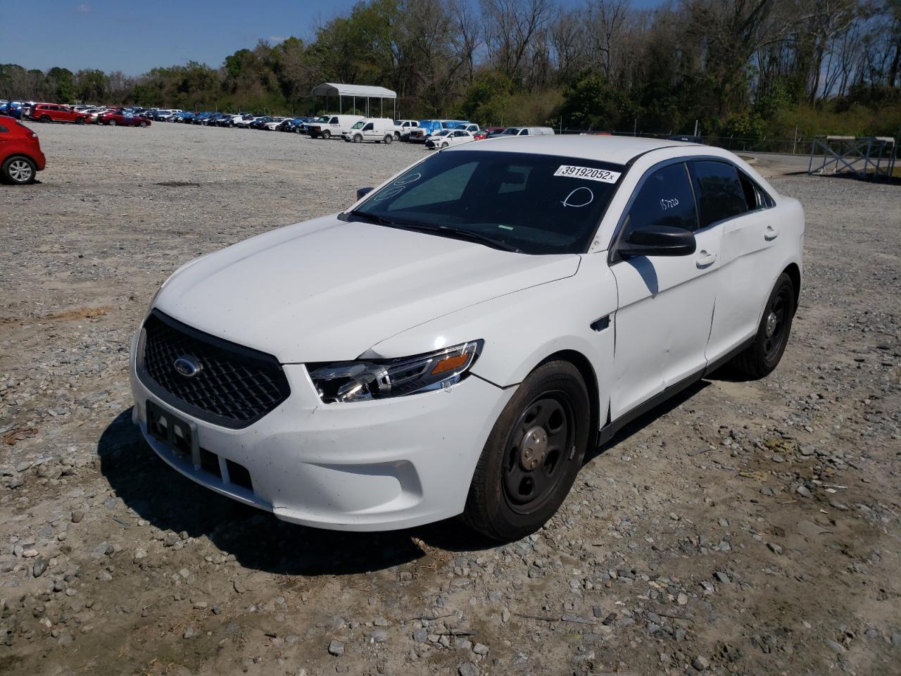 Photo 2 from auction – 2014 FORD TAURUS POL with VIN 1FAHP2L81EG159531
