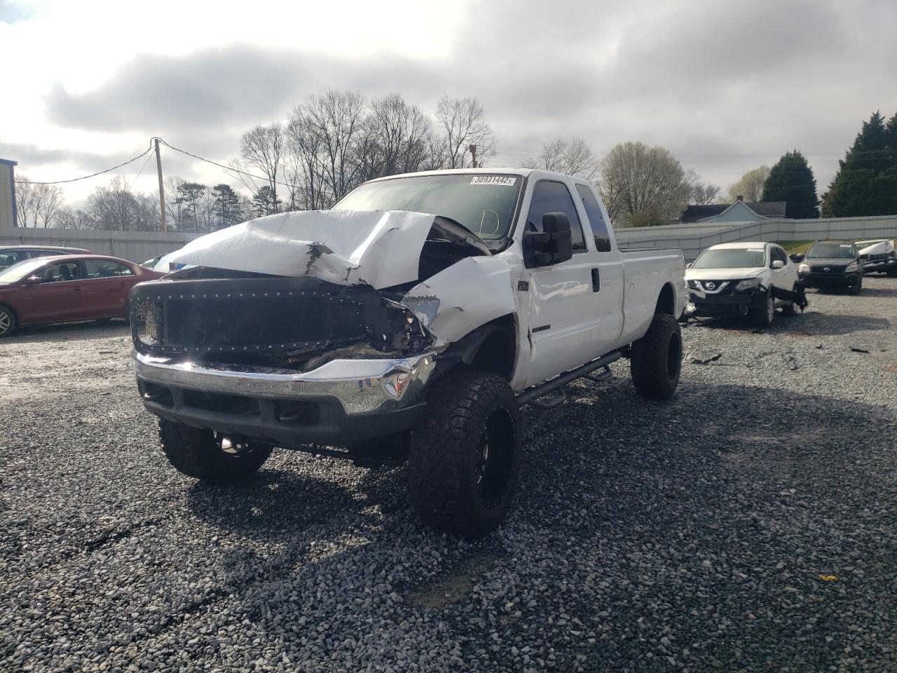 Photo 2 from auction – 2001 FORD F250 4X4 with VIN 1FTNX21F41EA52221