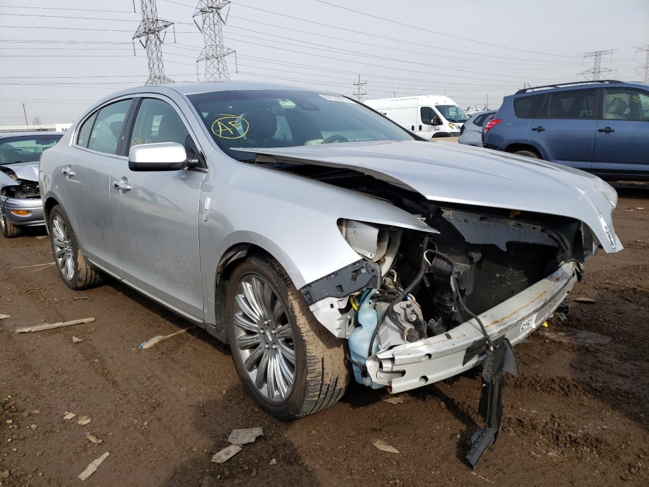 LINCOLN MKS 2013 with VIN 1LNHL9DK9DG607386 - Photo from auction