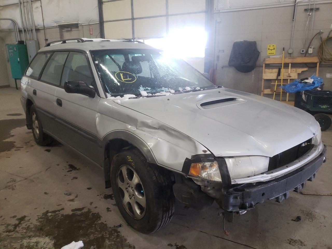 SUBARU LEGACY OUT 1999 with VIN 4S3BG6856X7626385 - Photo from auction
