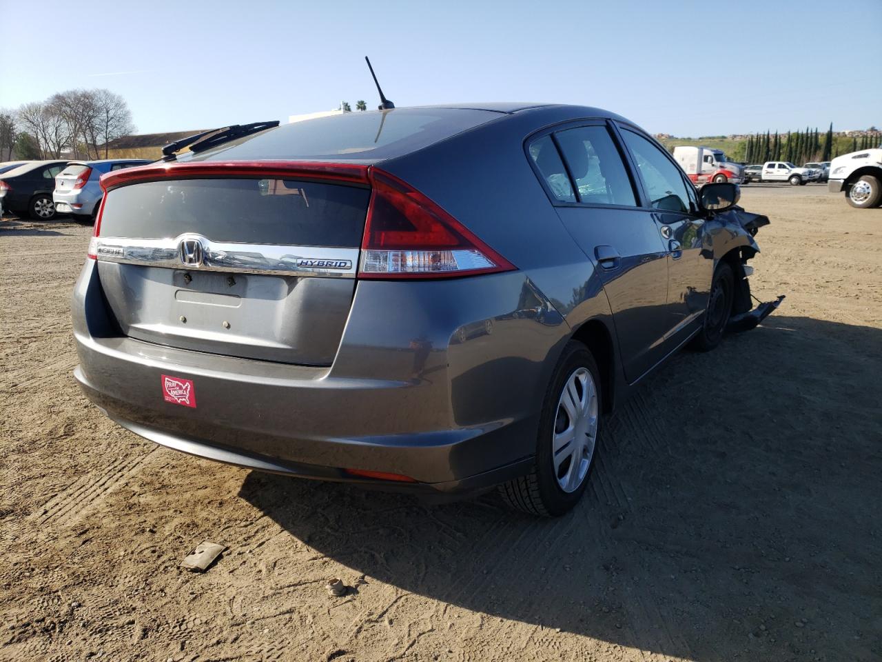 Photo 4 from auction – 2012 HONDA INSIGHT LX with VIN JHMZE2H57CS004025