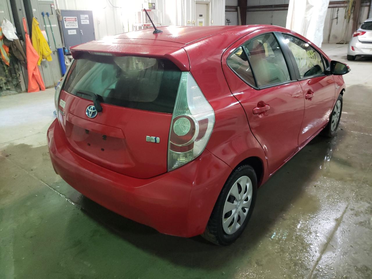 Photo 4 from auction – 2014 TOYOTA PRIUS C with VIN JTDKDTB36E1559785