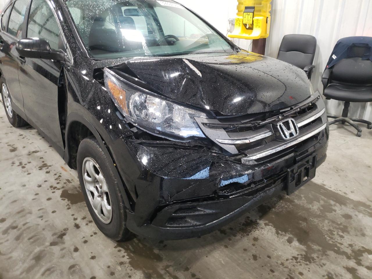 Photo 9 from auction – 2013 HONDA CR-V LX with VIN 2HKRM4H38DH620671