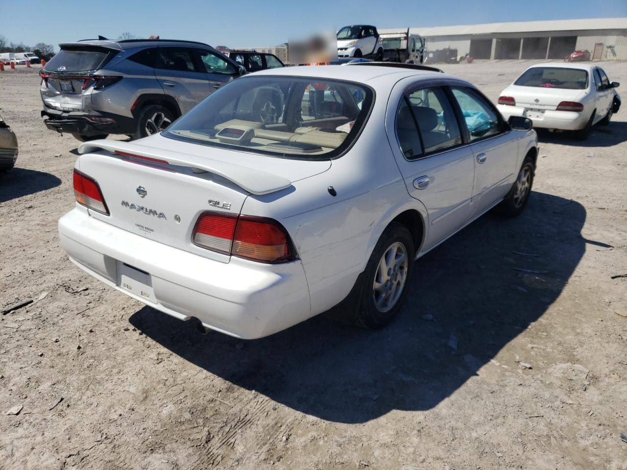 Photo 4 from auction – 1998 NISSAN MAXIMA GLE with VIN JN1CA21D6WT529325