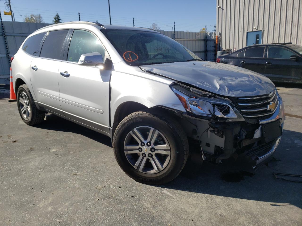 CHEVROLET TRAVERSE L 2017 with VIN 1GNKRHKD6HJ197735 - Photo from auction