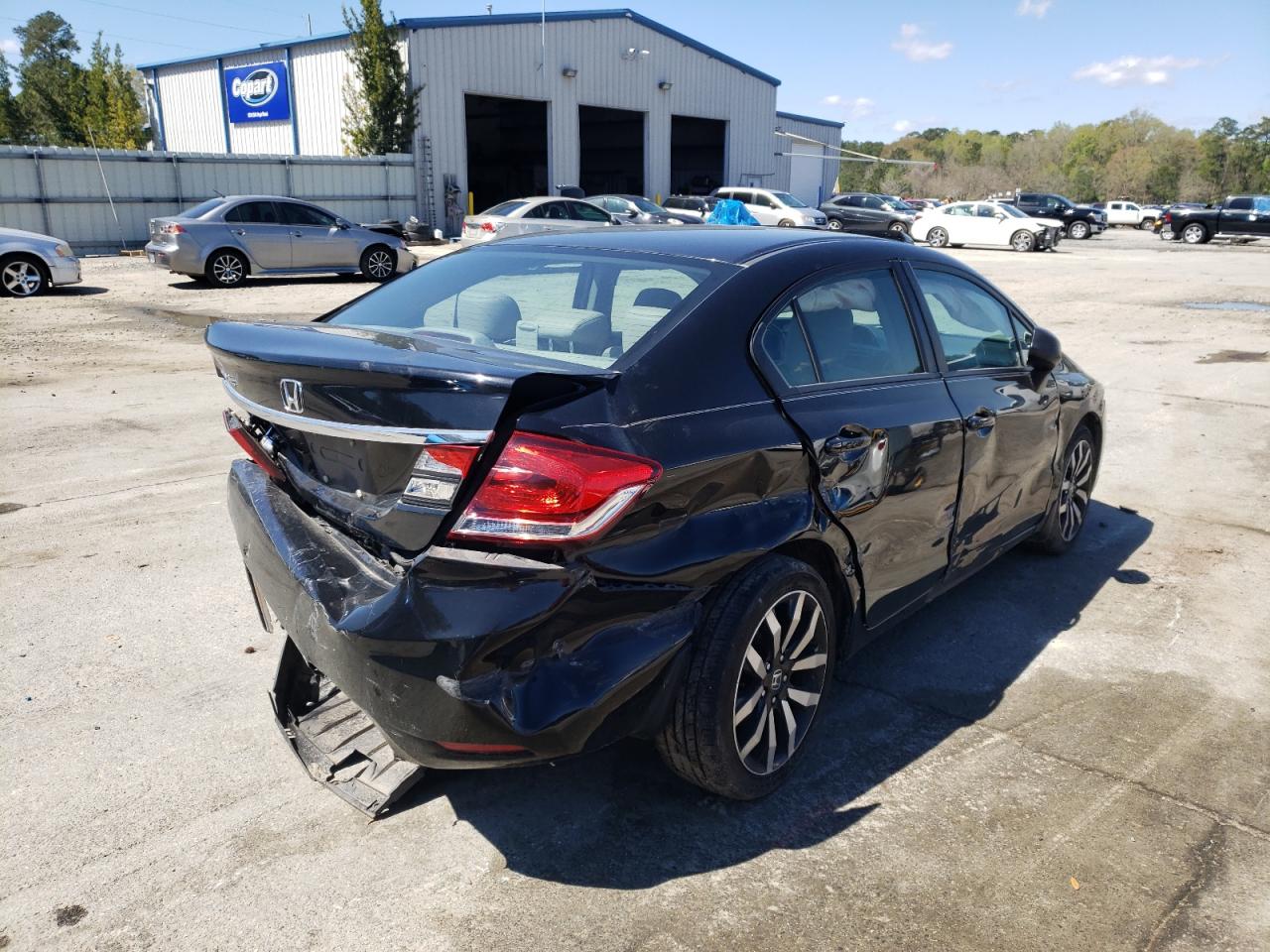 Photo 4 from auction – 2015 HONDA CIVIC EXL with VIN 19XFB2F9XFE013991