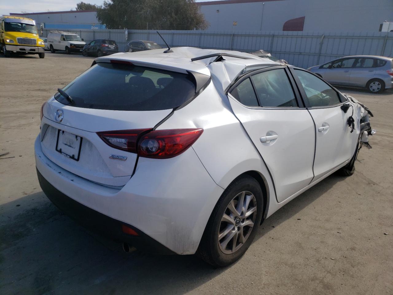 Photo 4 from auction – 2015 MAZDA 3 TOURING with VIN 3MZBM1L78FM218959