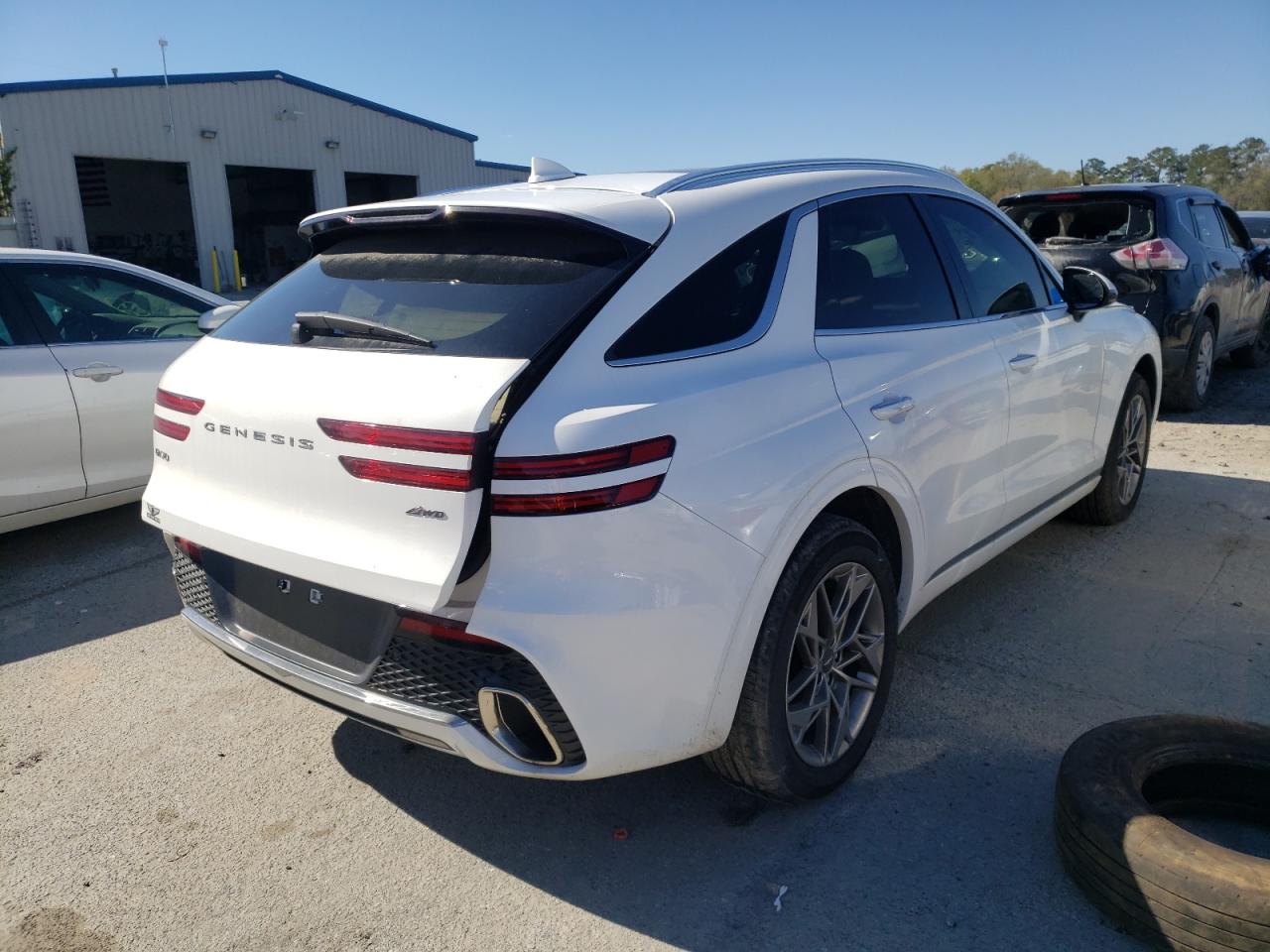 Photo 4 from auction – 2022 GENESIS GV70 BASE with VIN KMUMADTB8NU026765