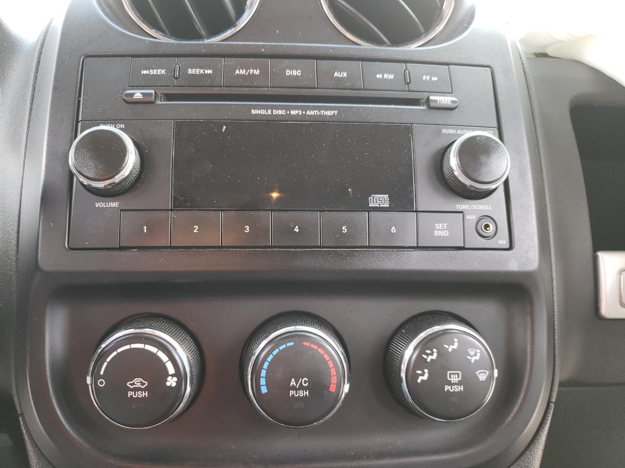 Photo 9 from auction – 2015 JEEP COMPASS SP with VIN 1C4NJCBA9FD273420