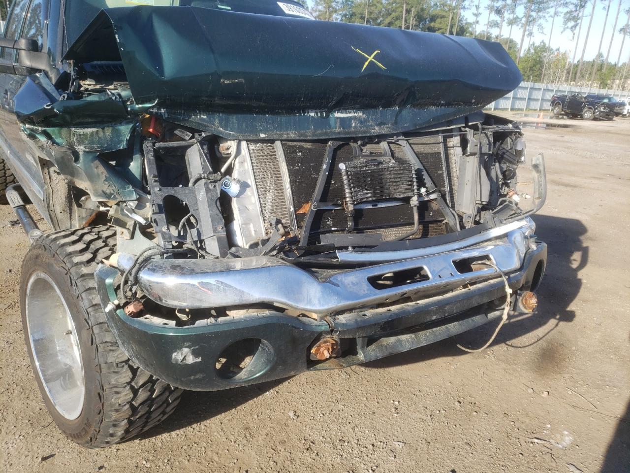 Photo 9 from auction – 2004 GMC SIERRA C25 with VIN 1GTHC23274F183614