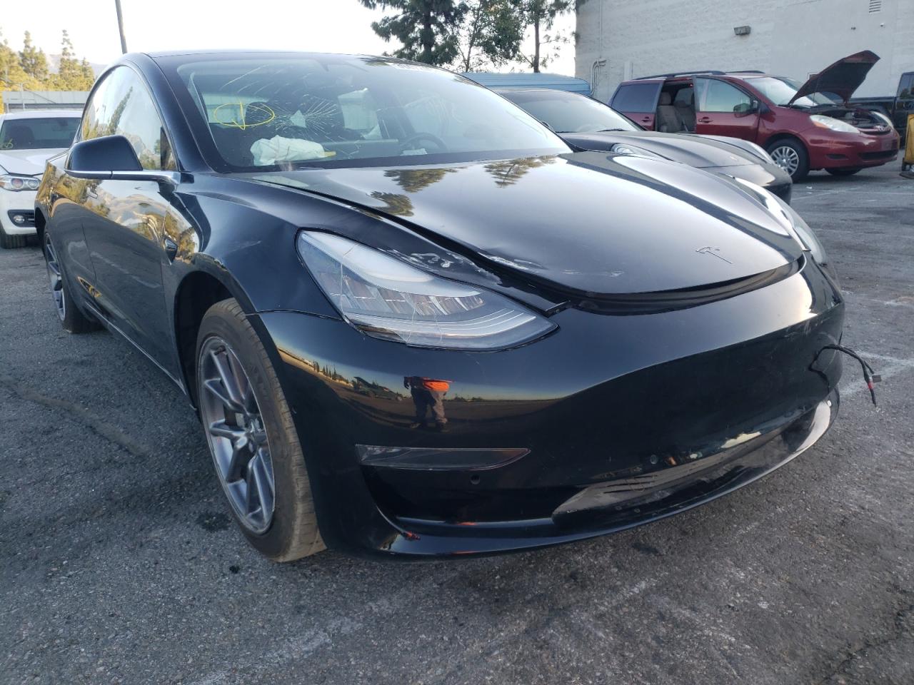 TESLA MODEL 3 2020 with VIN 5YJ3E1EAXLF657366 - Photo from auction