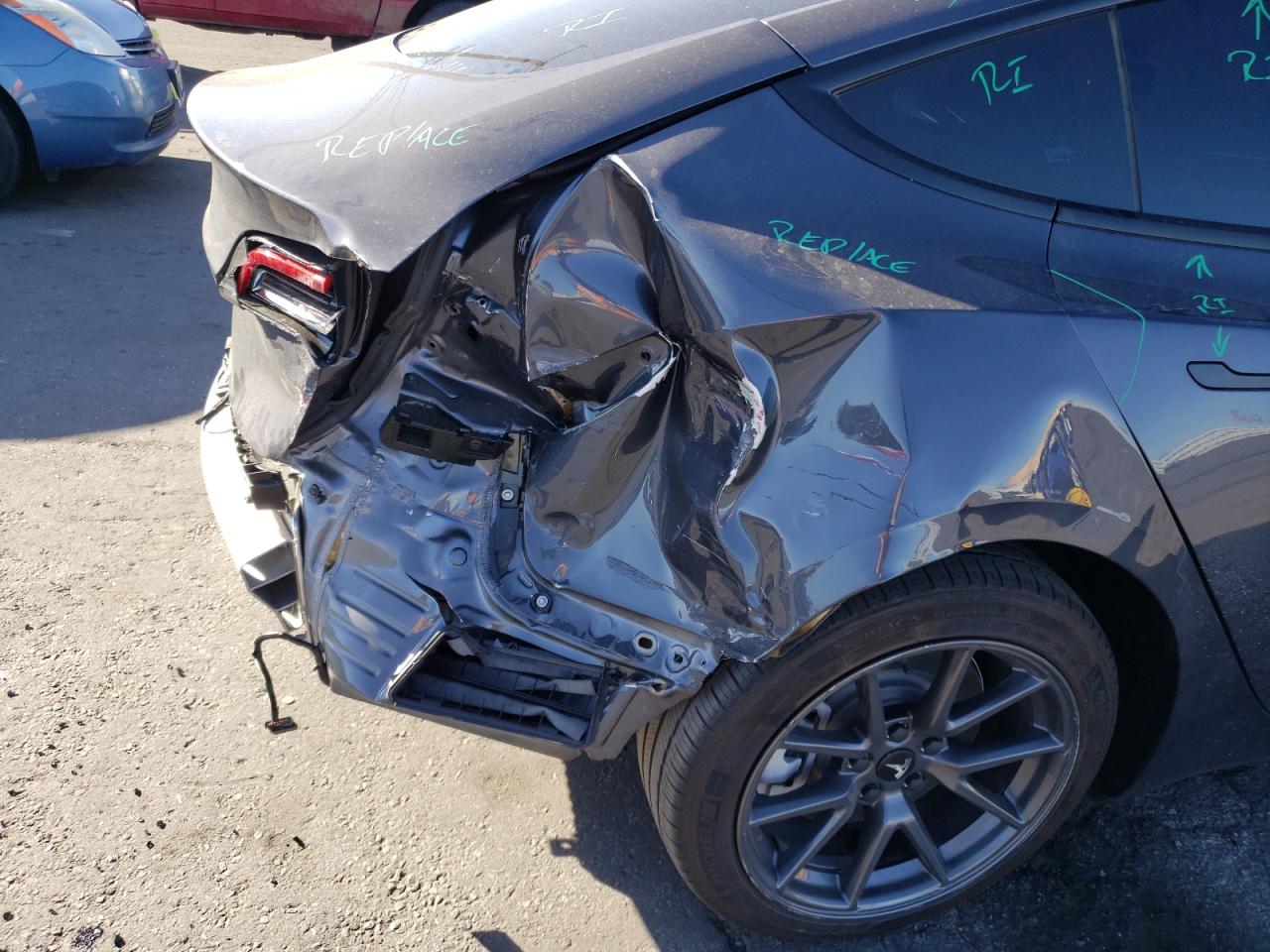 Photo 9 from auction – 2021 TESLA MODEL 3 with VIN 5YJ3E1EA3MF051618