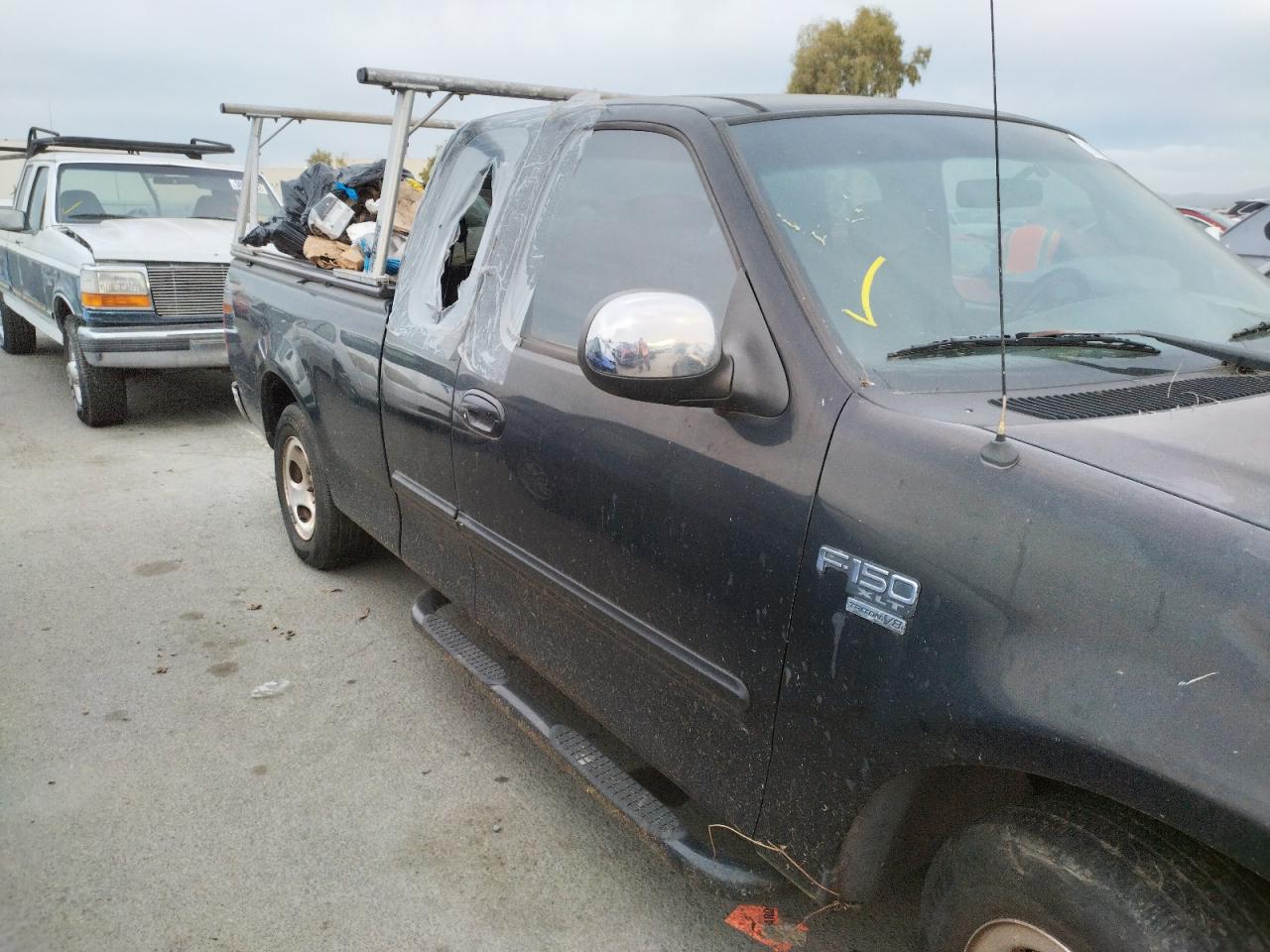 Photo 9 from auction – 2001 FORD F150 with VIN 1FTRX17W91NB03814