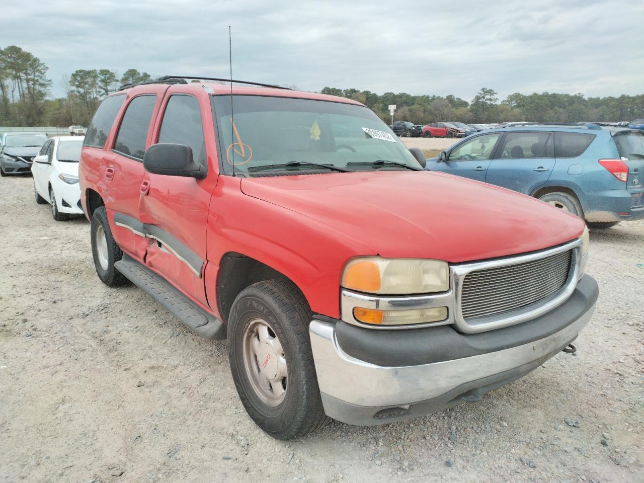 GMC YUKON 2001 with VIN 1GKEC13TX1R206923 - Photo from auction