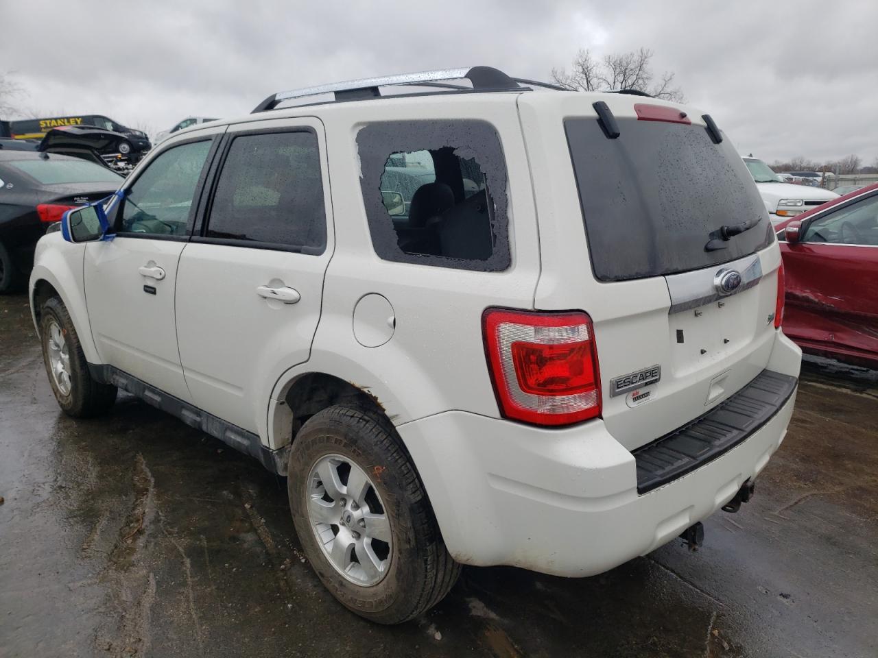 Photo 3 from auction – 2011 FORD ESCAPE LIM with VIN 1FMCU0EG8BKA80433