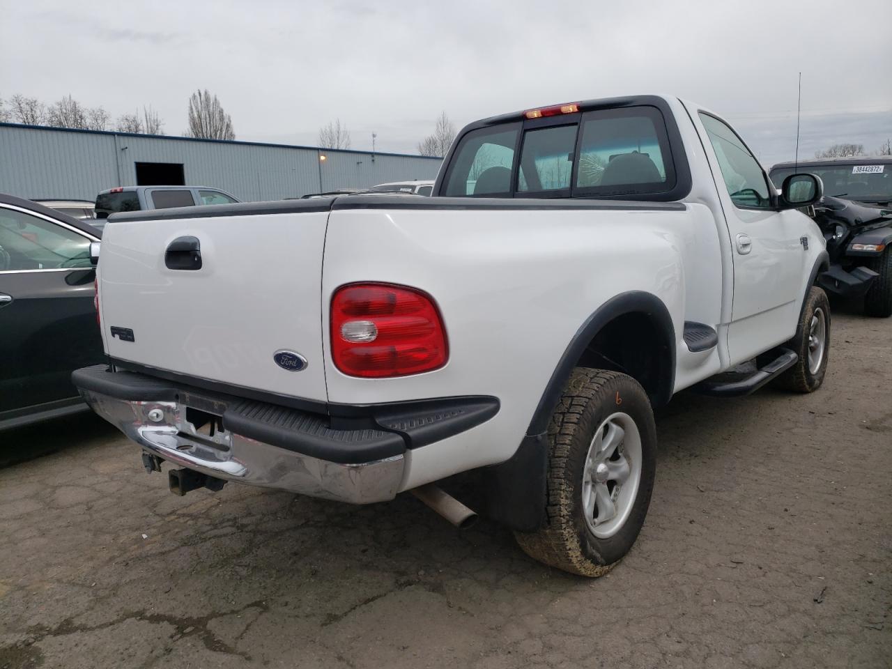 Photo 4 from auction – 1999 FORD F150 with VIN 2FTRF08L1XCA55872