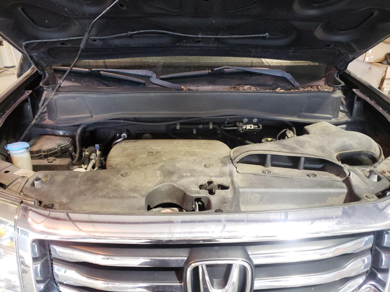 Photo 7 from auction – 2014 HONDA PILOT EX with VIN 5FNYF4H40EB011203