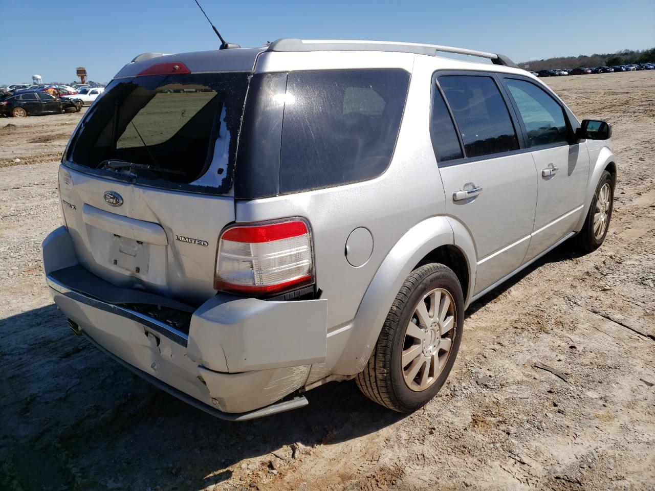 Photo 4 from auction – 2009 FORD TAURUS X L with VIN 1FMDK03W69GA03741
