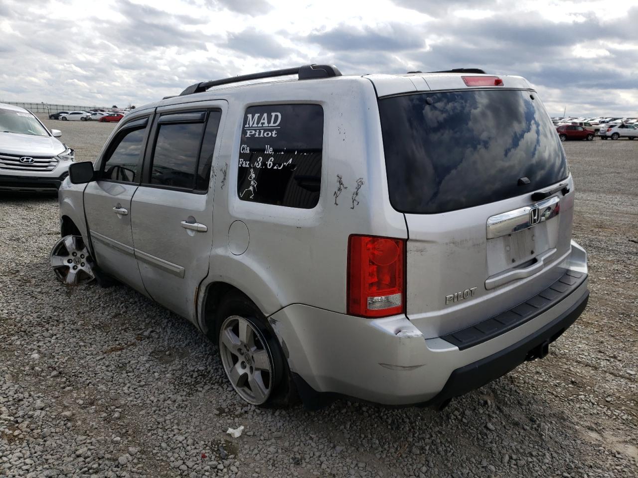 Photo 3 from auction – 2011 HONDA PILOT EXL with VIN 5FNYF3H56BB036203