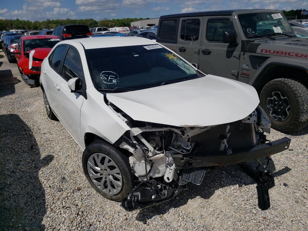 TOYOTA COROLLA 2017 with VIN 5YFBURHE3HP584543 - Photo from auction