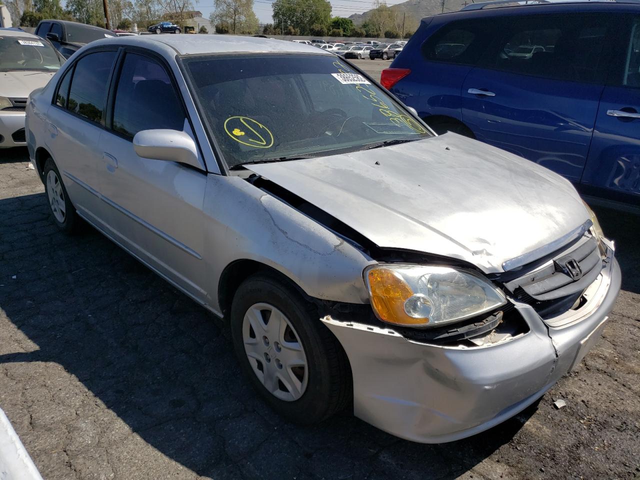 Photo 1 from auction – 2003 HONDA CIVIC LX with VIN 2HGES16563H570952