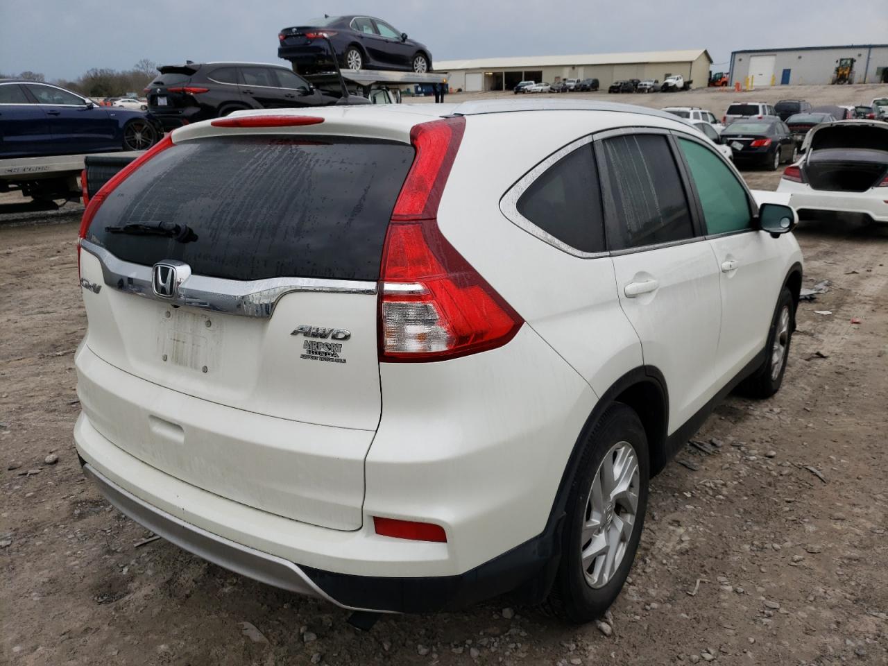 Photo 4 from auction – 2015 HONDA CR-V EXL with VIN 5J6RM4H77FL032563