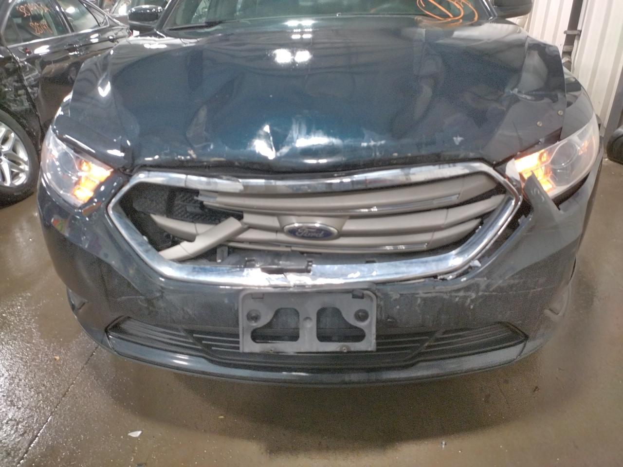 Photo 9 from auction – 2014 FORD TAURUS SEL with VIN 1FAHP2E88EG162858