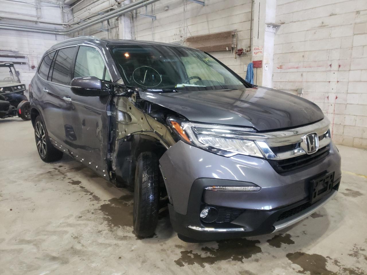 HONDA PILOT ELIT 2019 with VIN 5FNYF6H07KB048429 - Photo from auction