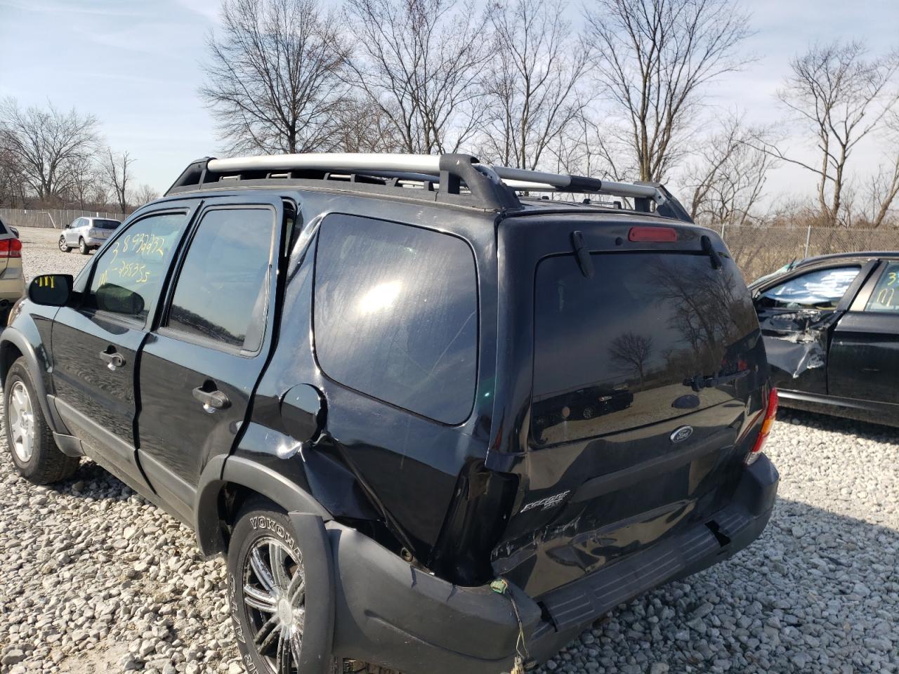 Photo 9 from auction – 2003 FORD ESCAPE XLT with VIN 1FMYU931X3KE19946