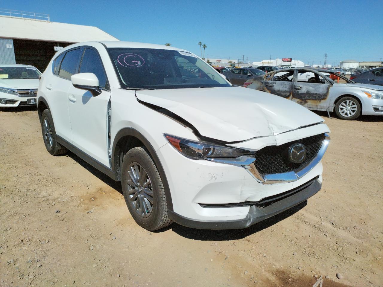 MAZDA CX-5 TOURI 2021 with VIN JM3KFACM6M0318617 - Photo from auction