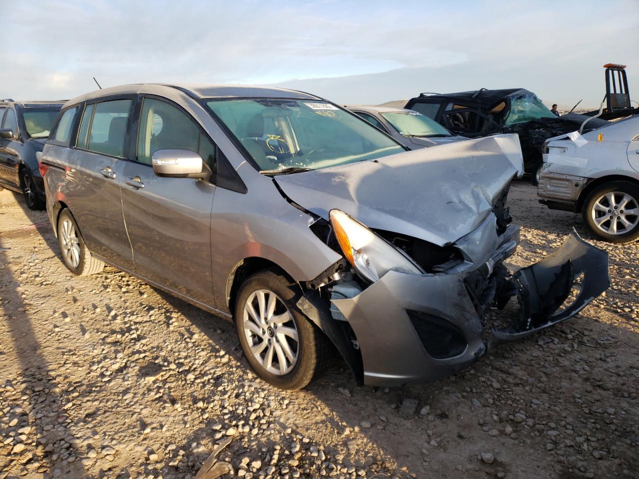 MAZDA 5 SPORT 2014 with VIN JM1CW2BL7E0166585 - Photo from auction
