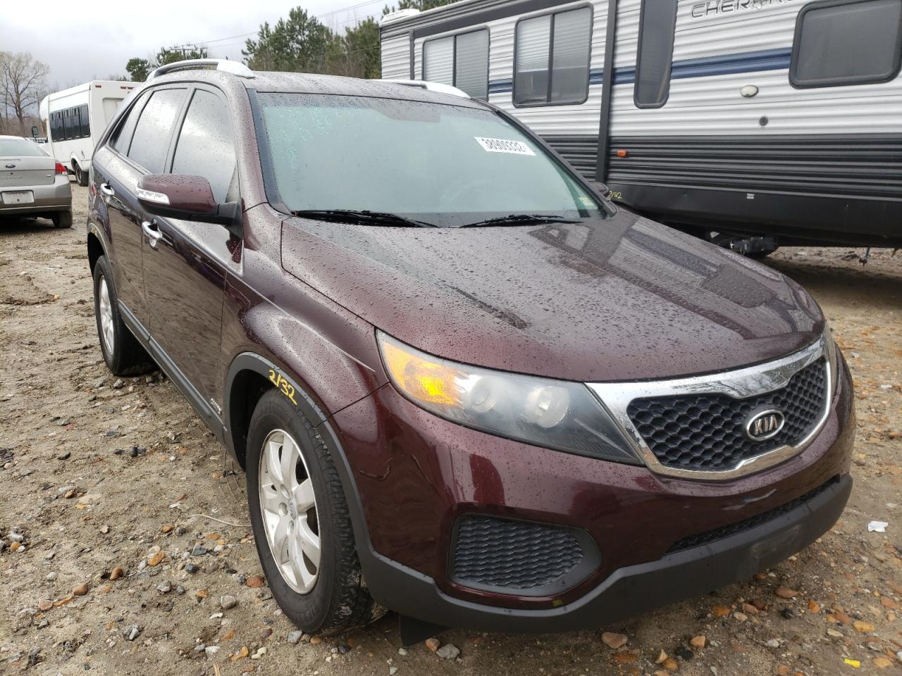 KIA SORENTO LX 2013 with VIN 5XYKTDA28DG335935 - Photo from auction