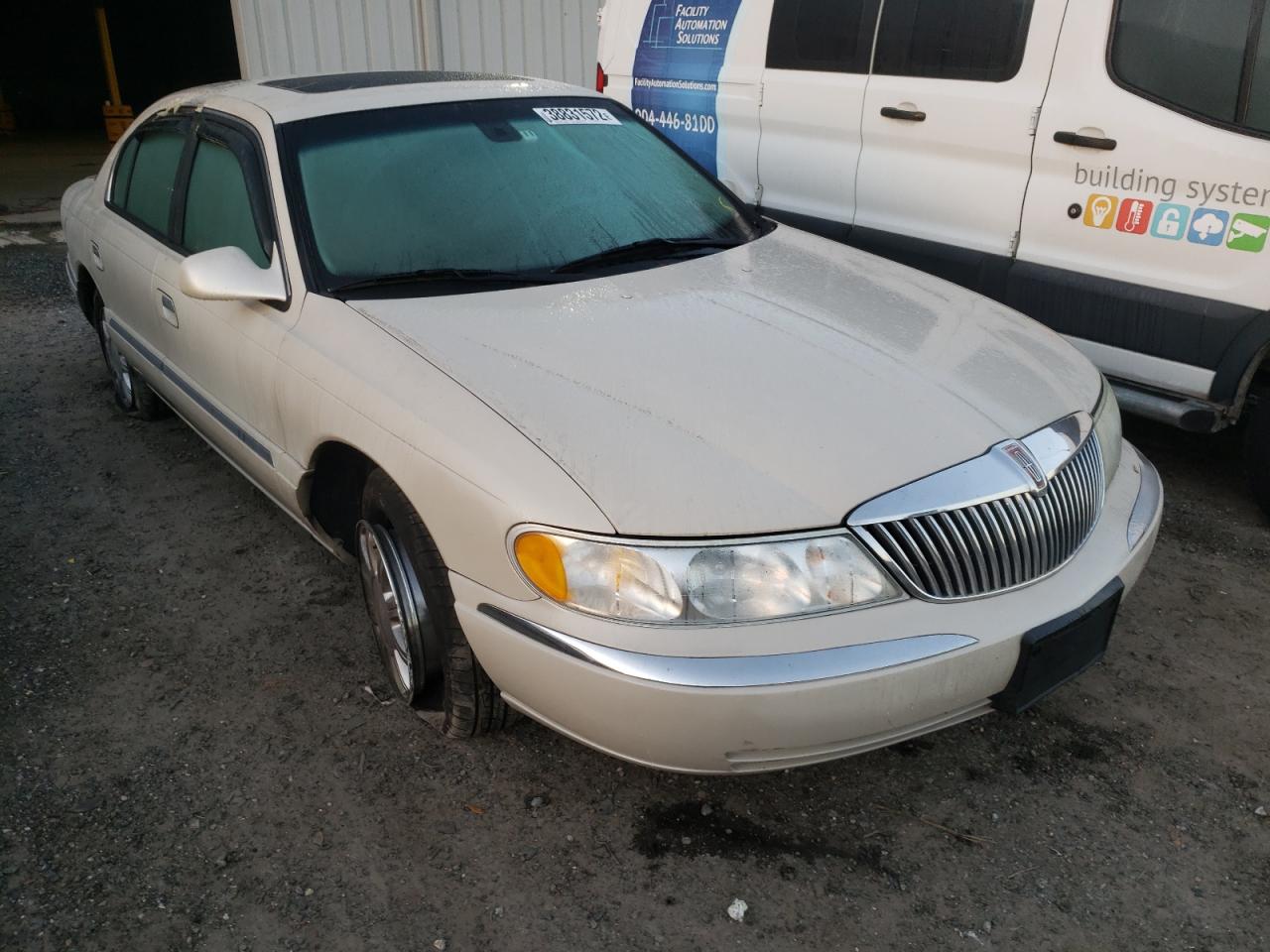 LINCOLN CONTINENTA 2002 with VIN 1LNHM97V42Y700035 - Photo from auction