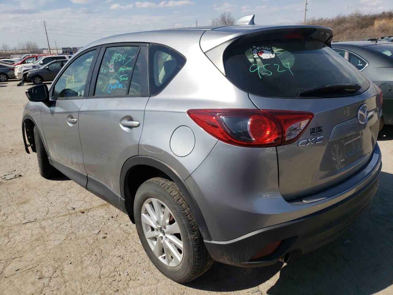 Photo 3 from auction – 2014 MAZDA CX-5 SPORT with VIN JM3KE2BE0E0358115