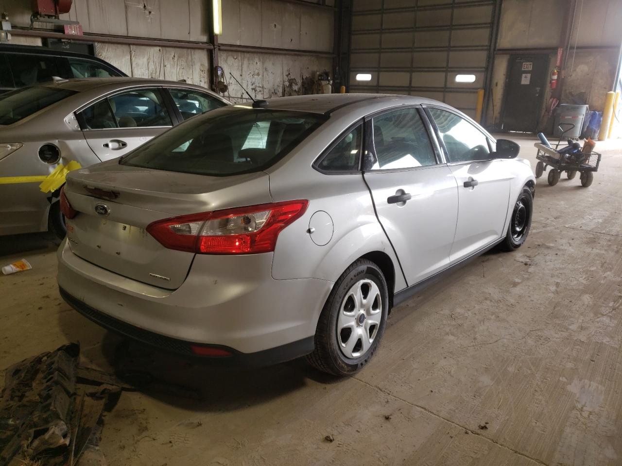 Photo 4 from auction – 2013 FORD FOCUS S with VIN 1FADP3E23DL276952