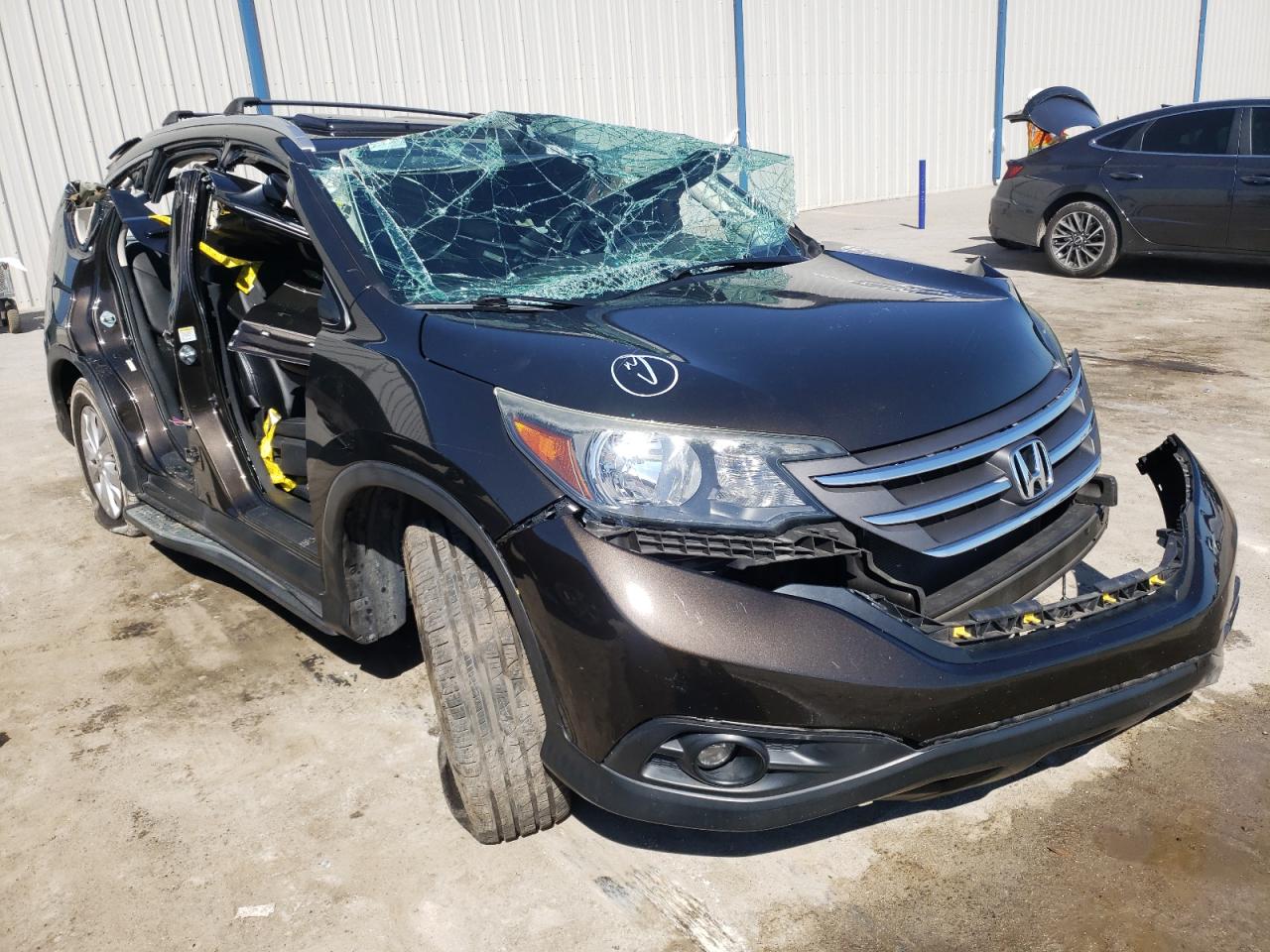 HONDA CR-V EXL 2014 with VIN 2HKRM4H74EH673355 - Photo from auction