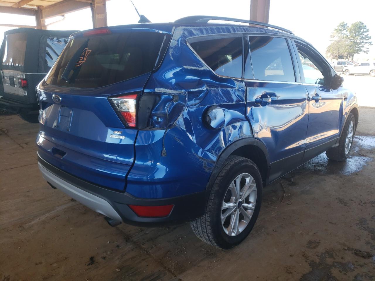 Photo 4 from auction – 2018 FORD ESCAPE SE with VIN 1FMCU0GD0JUC84696