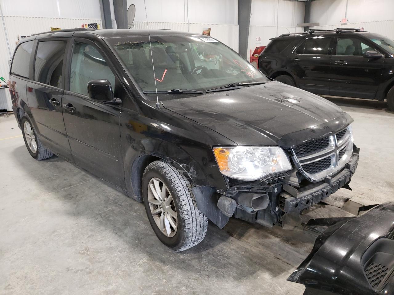 DODGE GRAND CARA 2015 with VIN 2C4RDGCG8FR648813 - Photo from auction