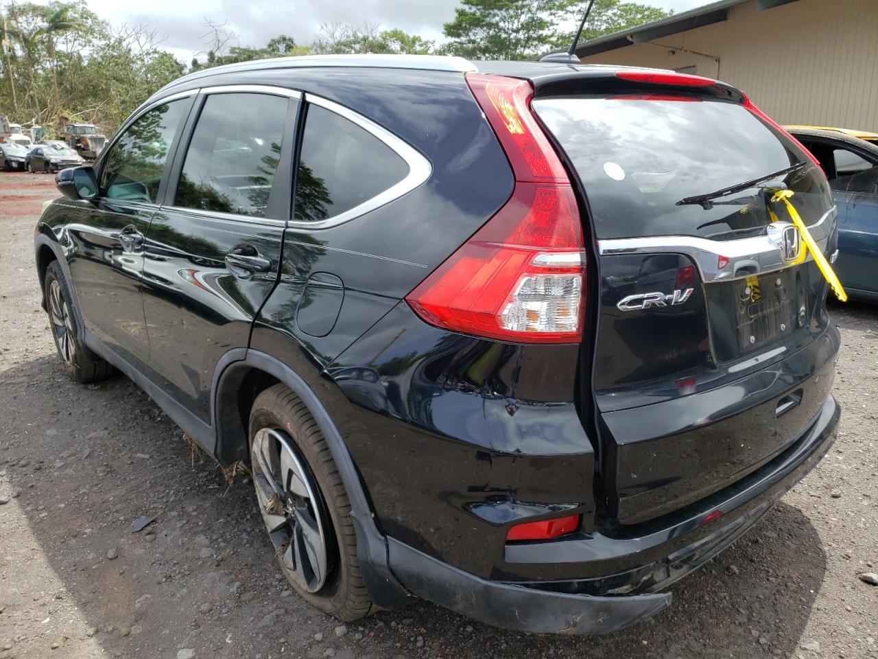 Photo 3 from auction – 2015 HONDA CR-V TOURI with VIN 5J6RM3H99FL021429