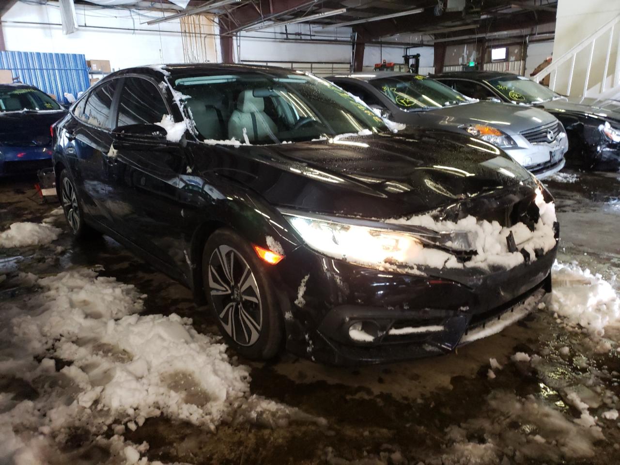 HONDA CIVIC EX 2016 with VIN 19XFC1F34GE015496 - Photo from auction