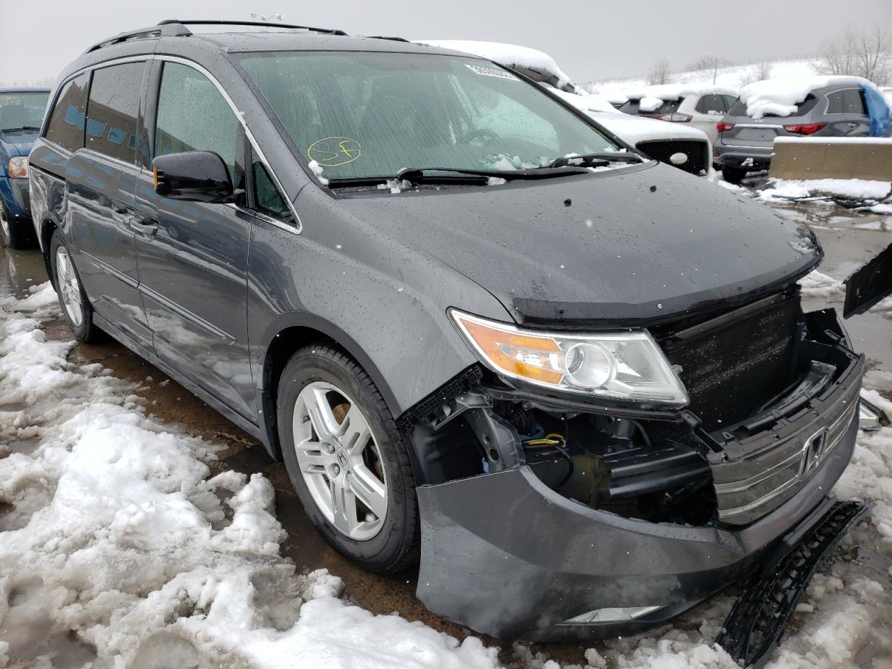 HONDA ODYSSEY TO 2012 with VIN 5FNRL5H96CB130577 - Photo from auction