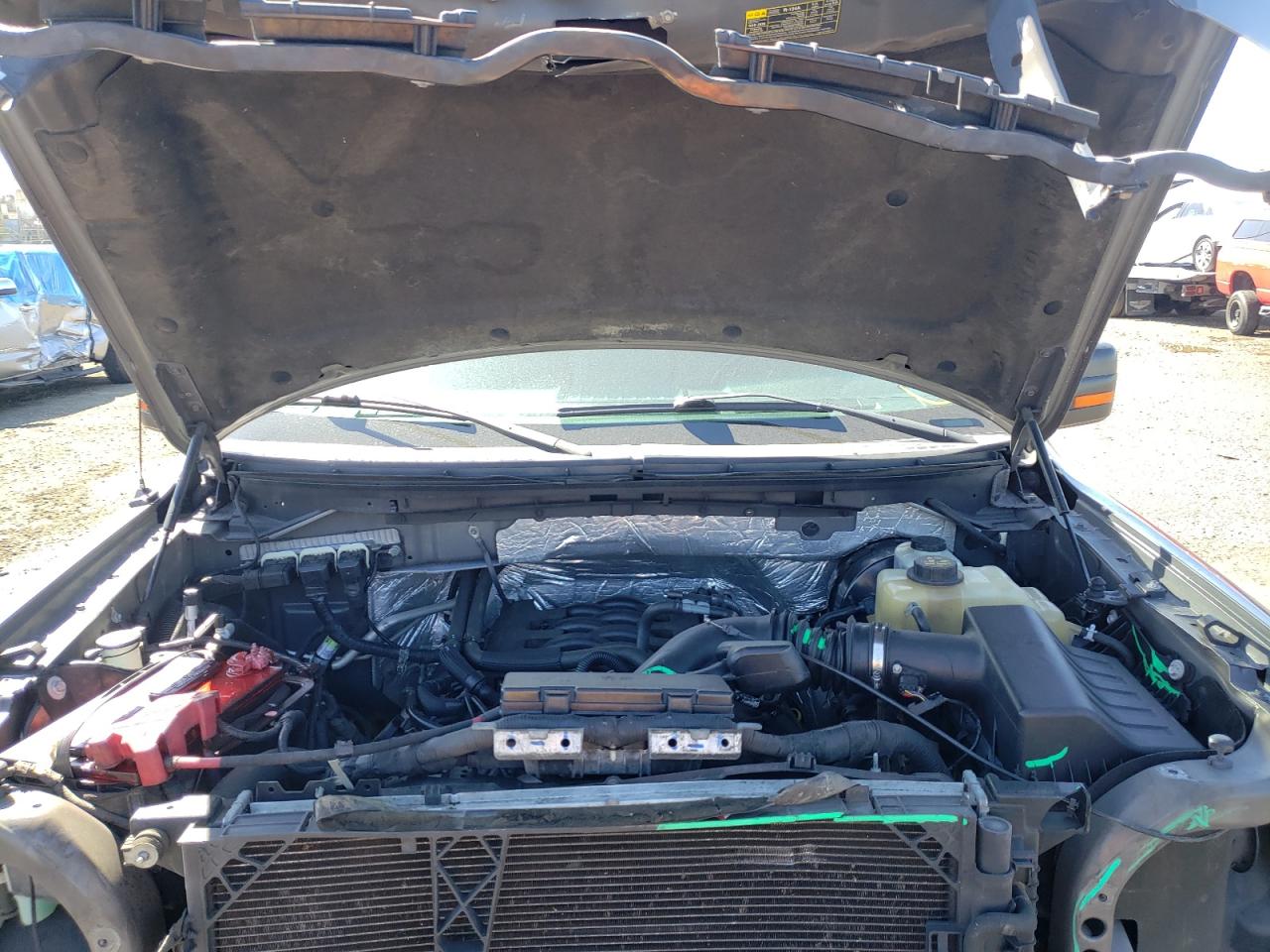 Photo 7 from auction – 2011 FORD F150 SUPER with VIN 1FTFX1CF7BKD04252
