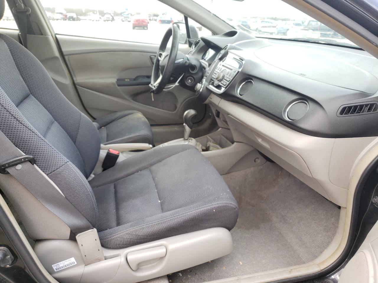 Photo 5 from auction – 2011 HONDA INSIGHT LX with VIN JHMZE2H56BS007495