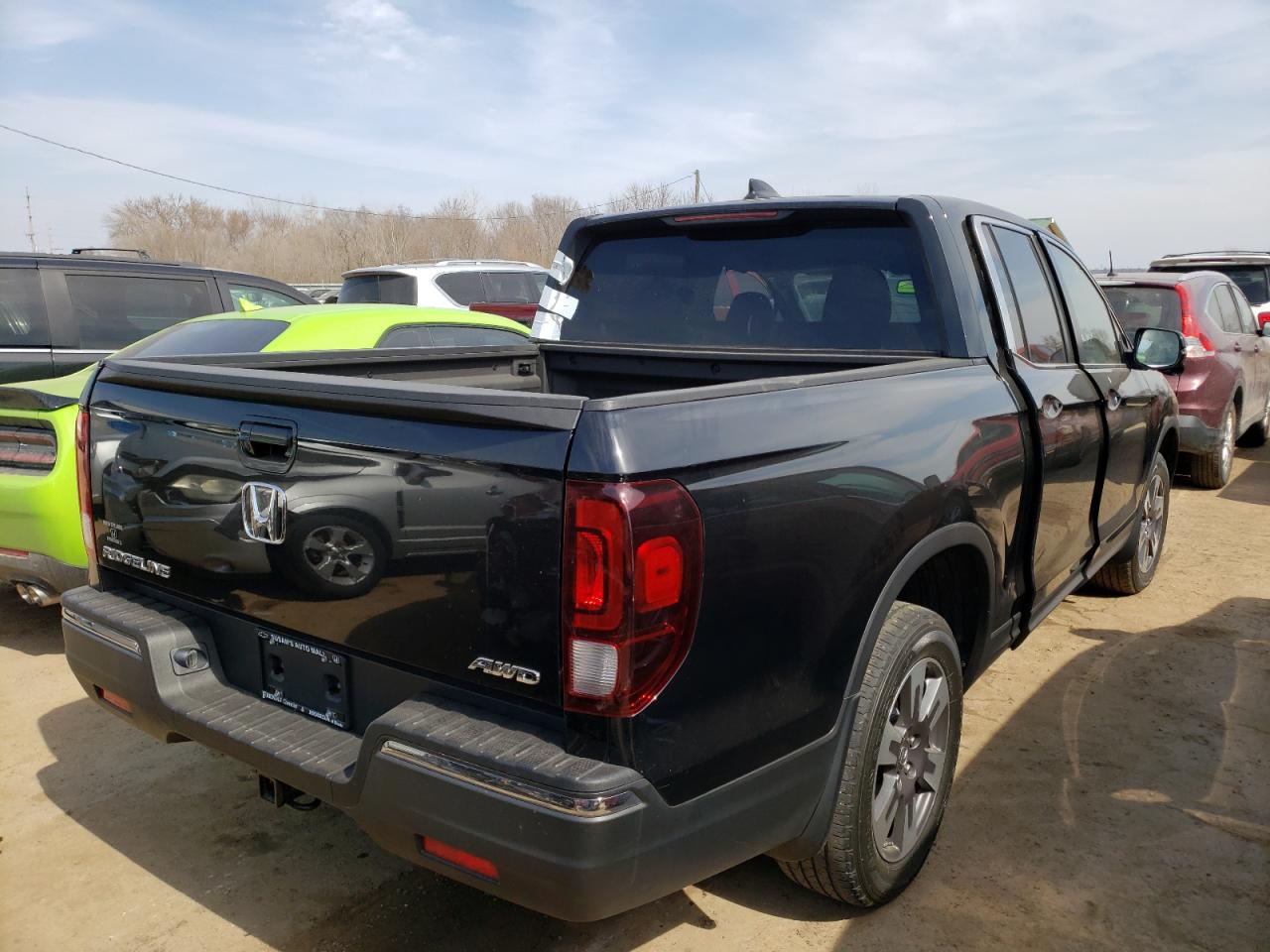Photo 4 from auction – 2017 HONDA RIDGELINE with VIN 5FPYK3F66HB038637