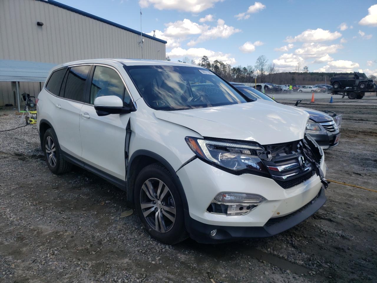 HONDA PILOT EXL 2017 with VIN 5FNYF5H51HB020253 - Photo from auction