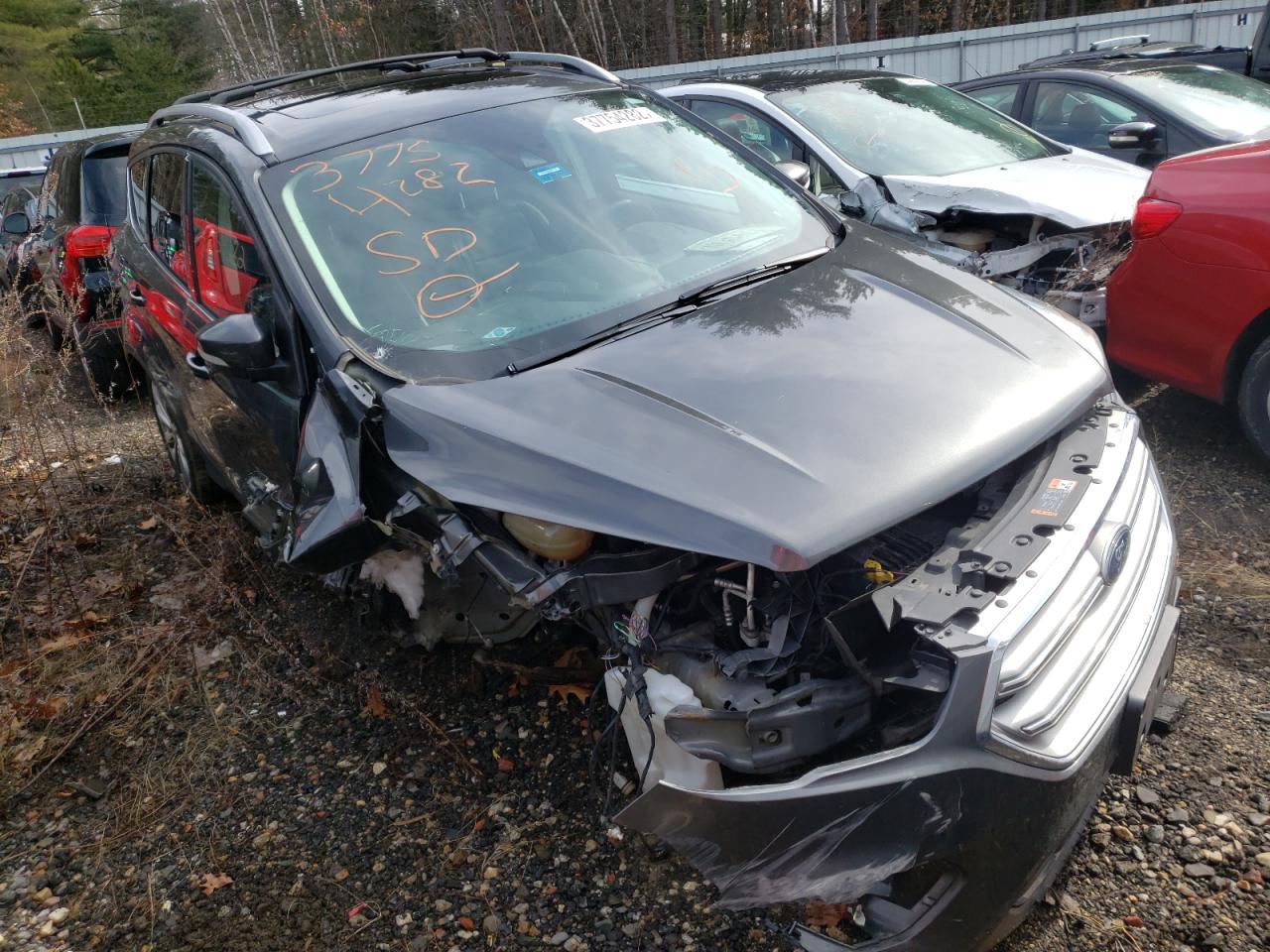 FORD ESCAPE TIT 2017 with VIN 1FMCU9J93HUD47891 - Photo from auction