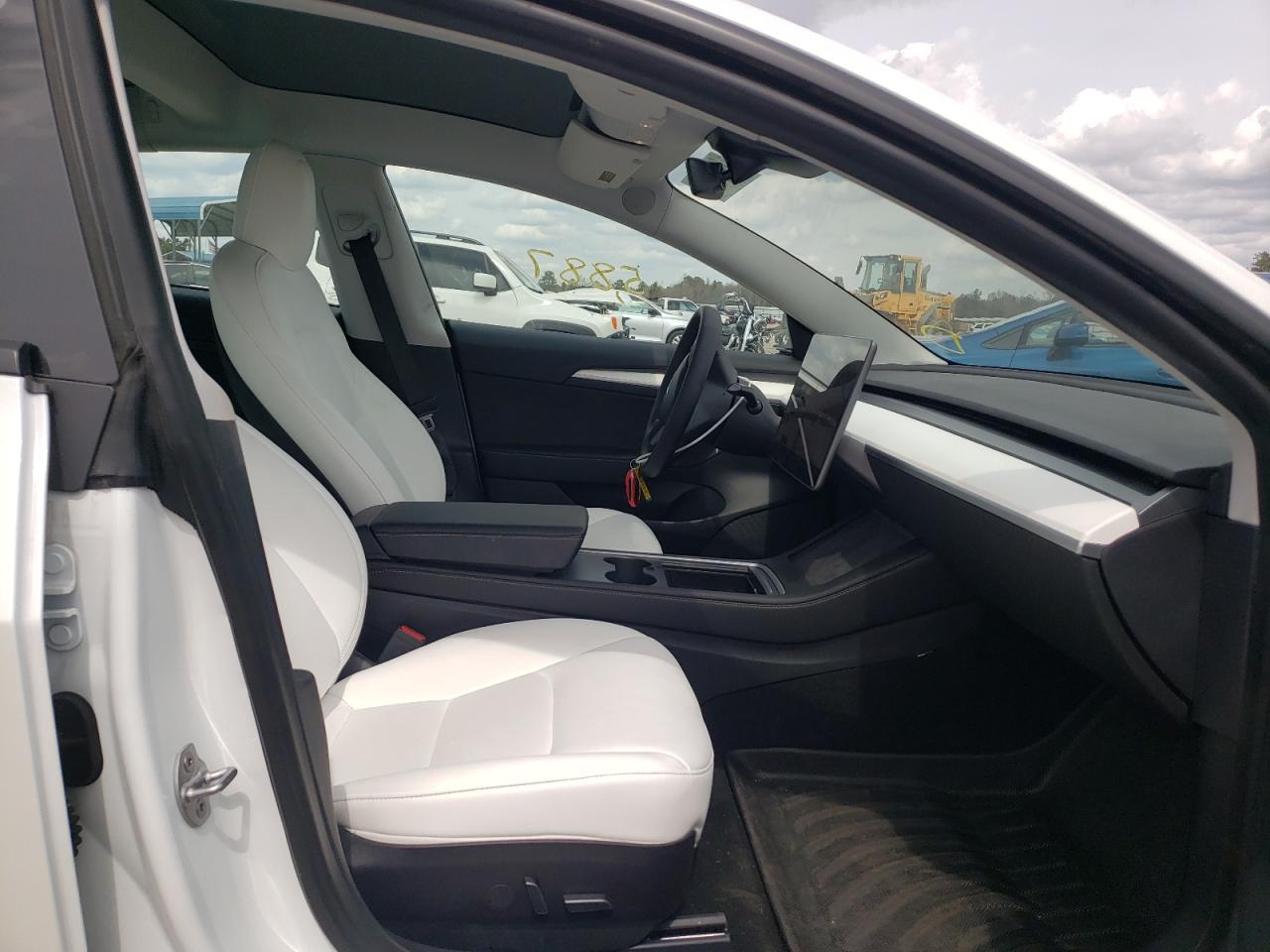 Photo 5 from auction – 2021 TESLA MODEL 3 with VIN 5YJ3E1EA0MF019239