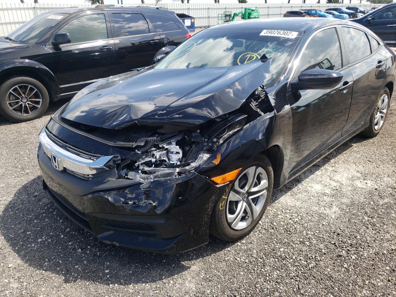 Photo 9 from auction – 2018 HONDA CIVIC LX with VIN 19XFC2F59JE030963