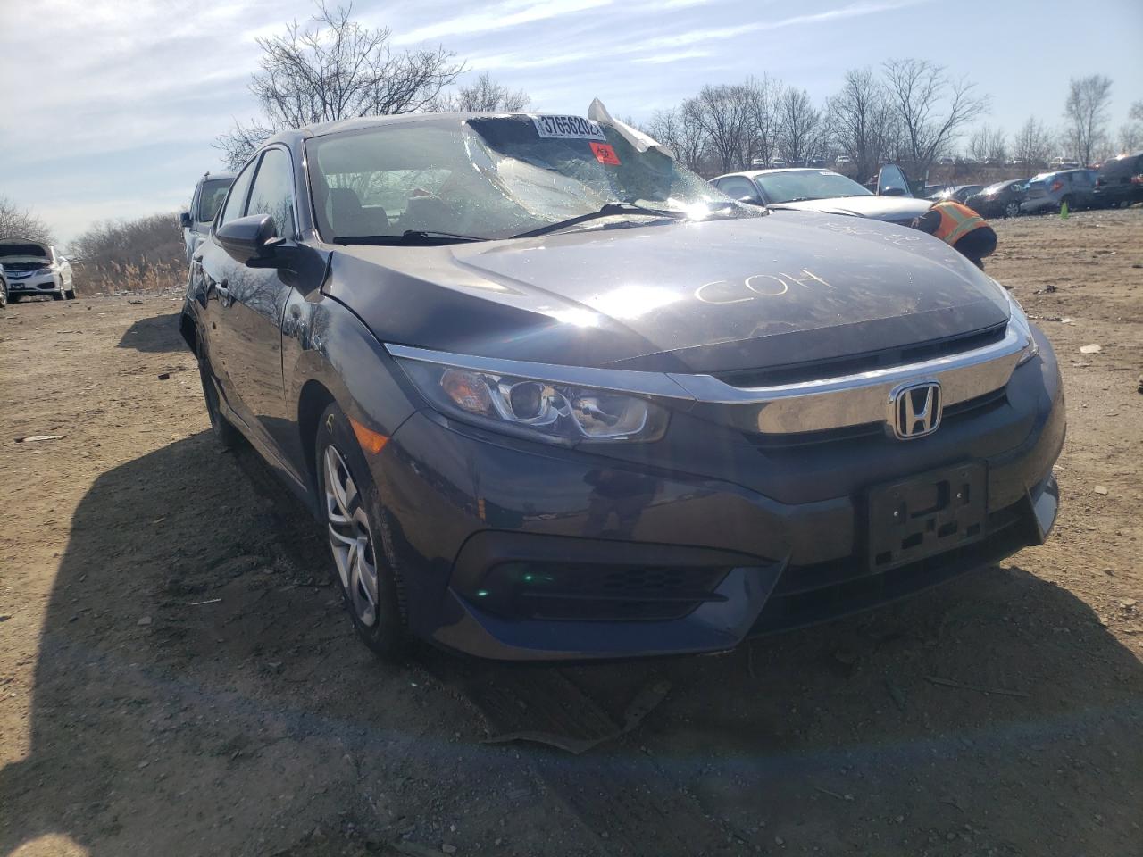 HONDA CIVIC LX 2018 with VIN 2HGFC2F58JH606502 - Photo from auction